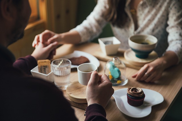 couple having meaningful conversation over coffee in calm morning light relationship closeness